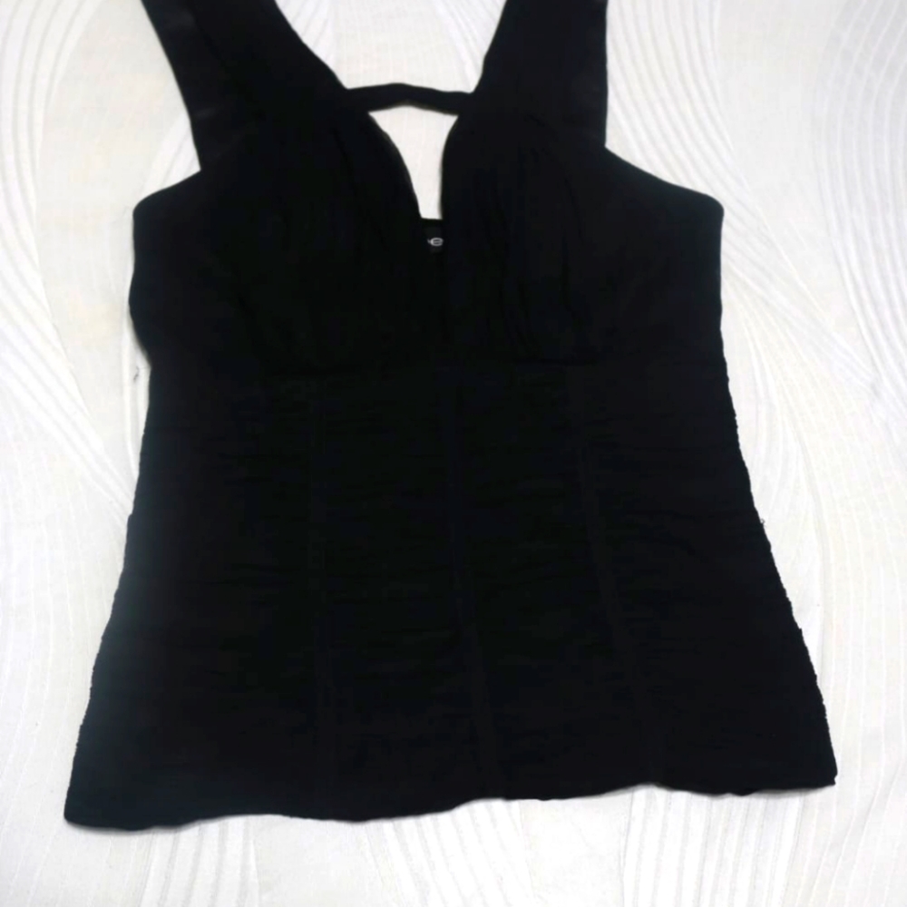 Bebe, black shirt with deep v on chest area